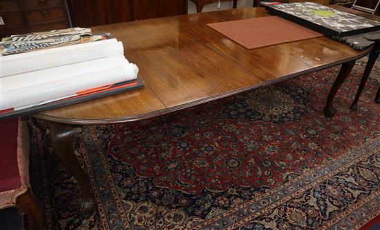 A 1920s mahogany extending dining table 244cm extended (three spare leaves-no winder)